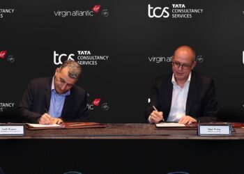 (L-R) Amit Kapur, Country Head - UK & Ireland, TCS; Shai Weiss, CEO - Virgin Atlantic Signing the Partnership Document